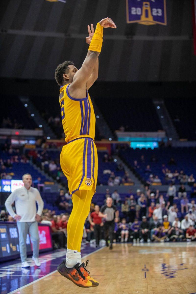 LSU men's basketball graduate student guard Jordan Wright (6) shoots the ball on Saturday, Feb. 3, 2024, during LSU's 94-74 win against Arkansas in the Pete Maravich Assembly Center in Baton Rouge, La.