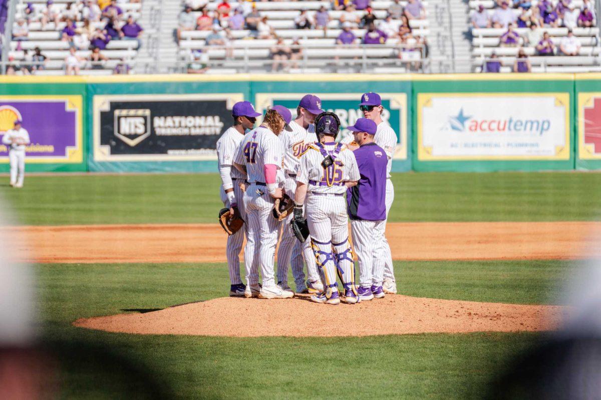 The LSU baseball team meets on the mound Friday, Feb. 23, 2024, during LSU&#8217;s 5-2 loss against Stony Brook at Alex Box Stadium in Baton Rouge, La.