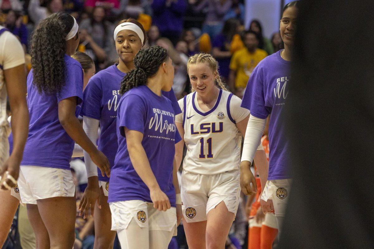 LSU women's basketball graduate student guard Hailey Van Lith (11) celebrates a half time score with her teammates Thursday, Feb. 22, 2024, during LSU's 71-66 win over Auburn Pete Maravich Assembly Center in Baton Rouge, La.