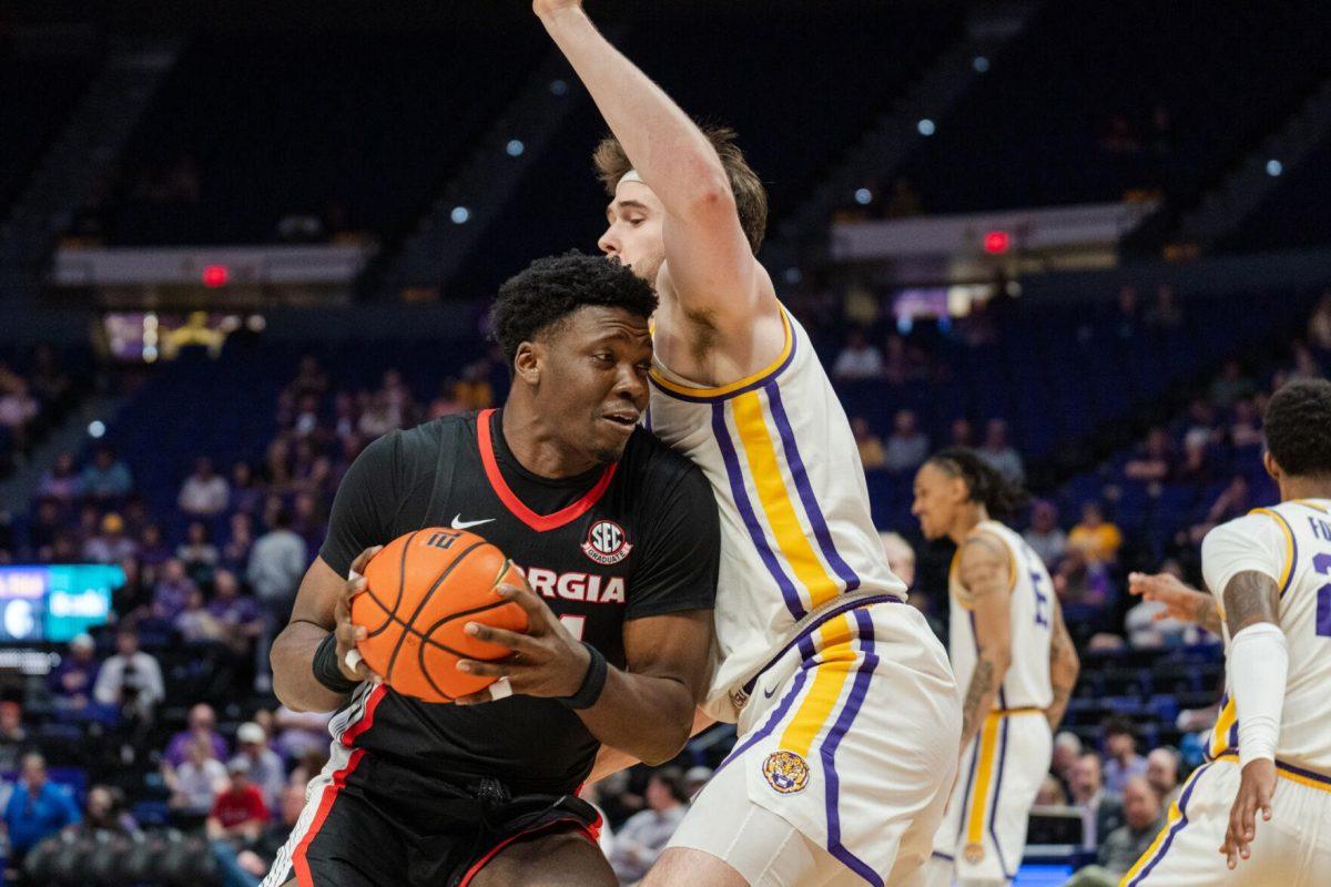 LSU men&#8217;s basketball graduate student forward Will Baker (9) defends against a Georgia player Tuesday, Feb. 27, 2024, during LSU&#8217;s 67-66 win against Georgia in the Pete Maravich Assembly Center in Baton Rouge, La.