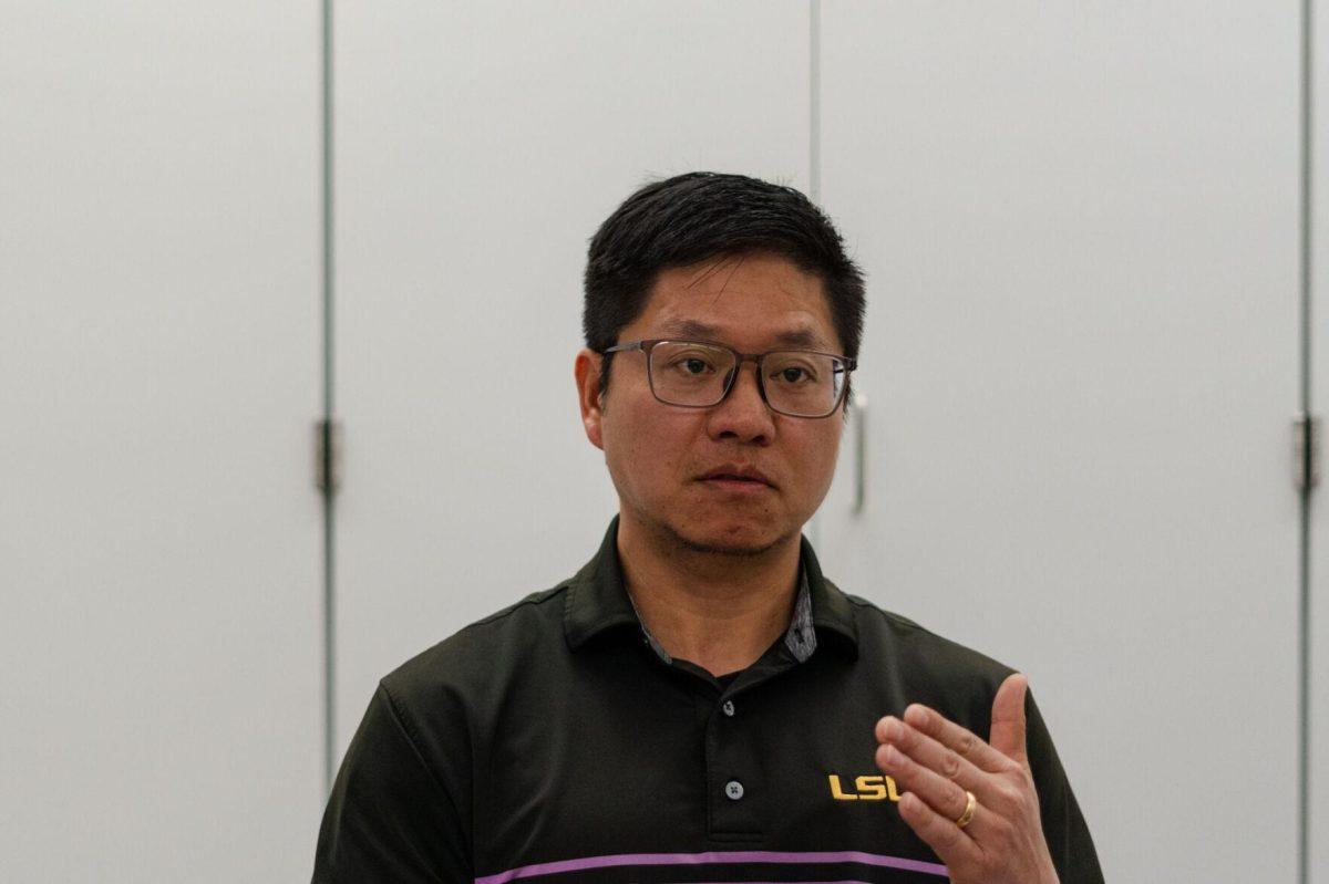 Senlin Chen discusses the child obesity program Wednesday, Feb. 28, 2024, inside the Huey P. Long Field House on LSU's campus in Baton Rouge, La.