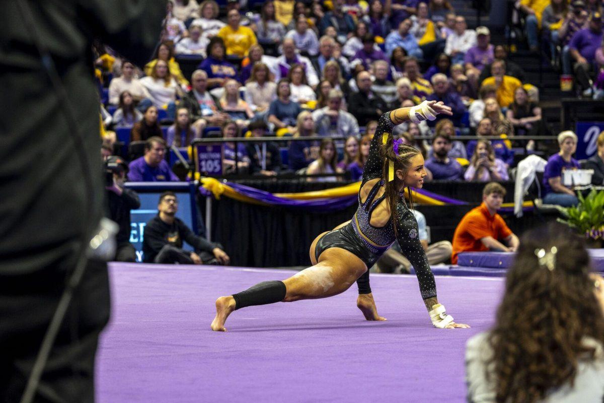 LSU gymnastics junior all-around KJ Johnson strikes a pose during her floor routine Friday, Feb. 16, 2024, during LSU's win 198.300-197.10 against Auburn in the Pete Maravich Assembly Center.