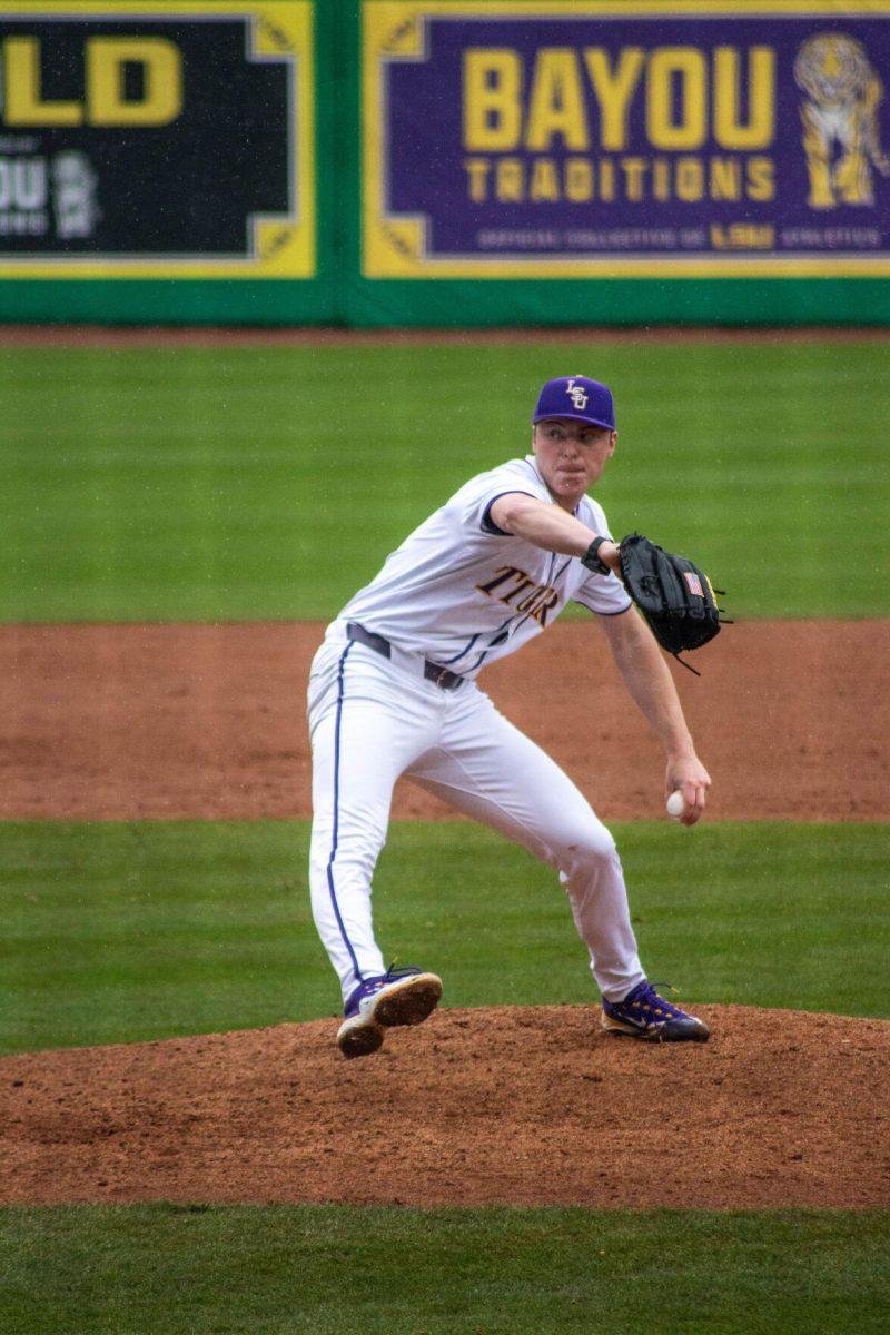 LSU baseball junior left-handed pitcher Justin Loer (6) prepares to pitch the ball during LSU's 11-8 win against VMI on Friday, Feb. 16, 2024, at Alex Box Stadium in Baton Rouge, La.