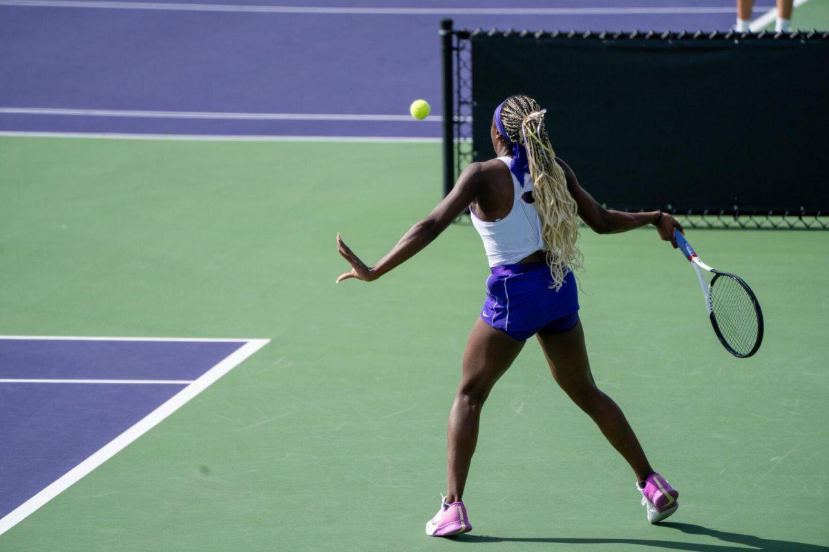 LSU women's tennis freshman Kinaa Graham hits a forehand during her unfinished 6-7, 6-2, 1-0 match against Rice Sunday, Feb. 4, 2023 at the LSU Tennis Complex on Gourrier Avenue in Baton Rouge, La.