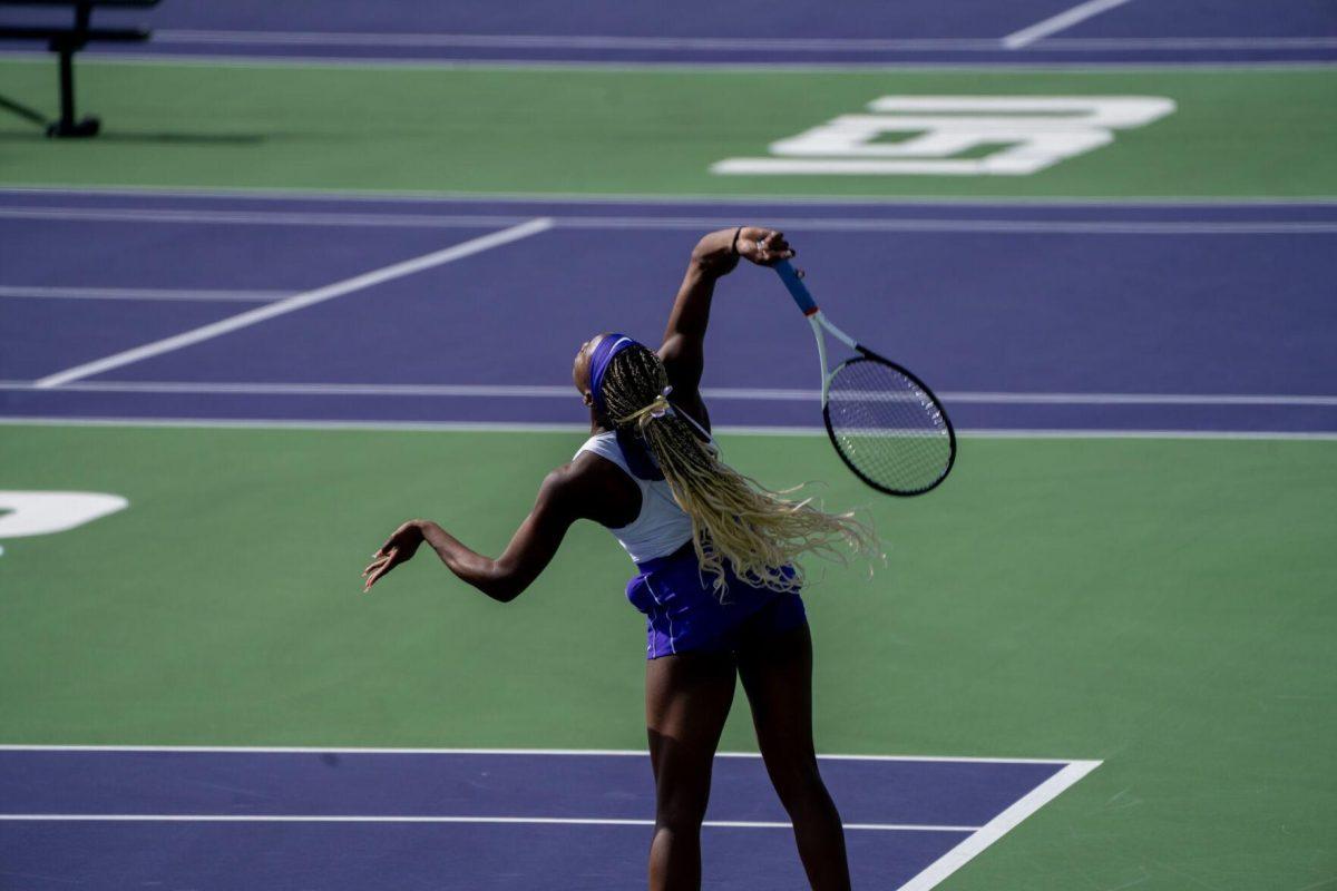 LSU women's tennis freshman Kinaa Graham hits a serve during her unfinished 6-7, 6-2, 1-0 match against Rice Sunday, Feb. 4, 2023 at the LSU Tennis Complex on Gourrier Avenue in Baton Rouge, La.