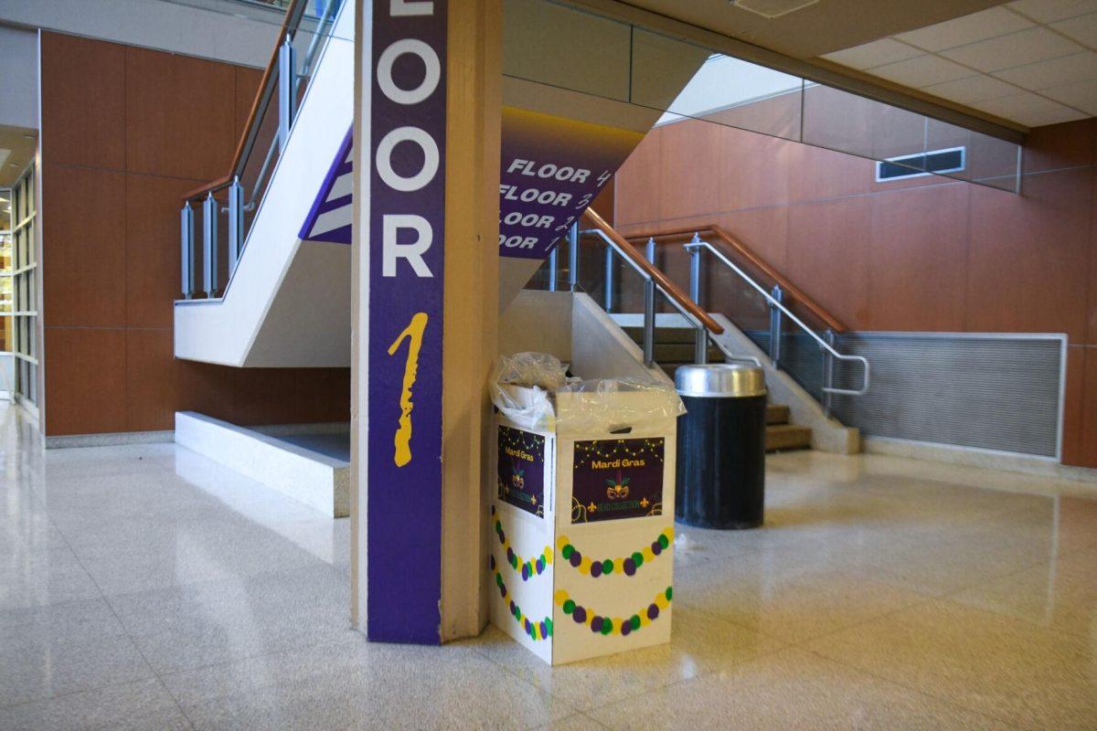 A donation box for Mardi Gras beads sits on the first floor of the LSU Student Union Tuesday, Feb. 20, 2024, in Baton Rouge, La.