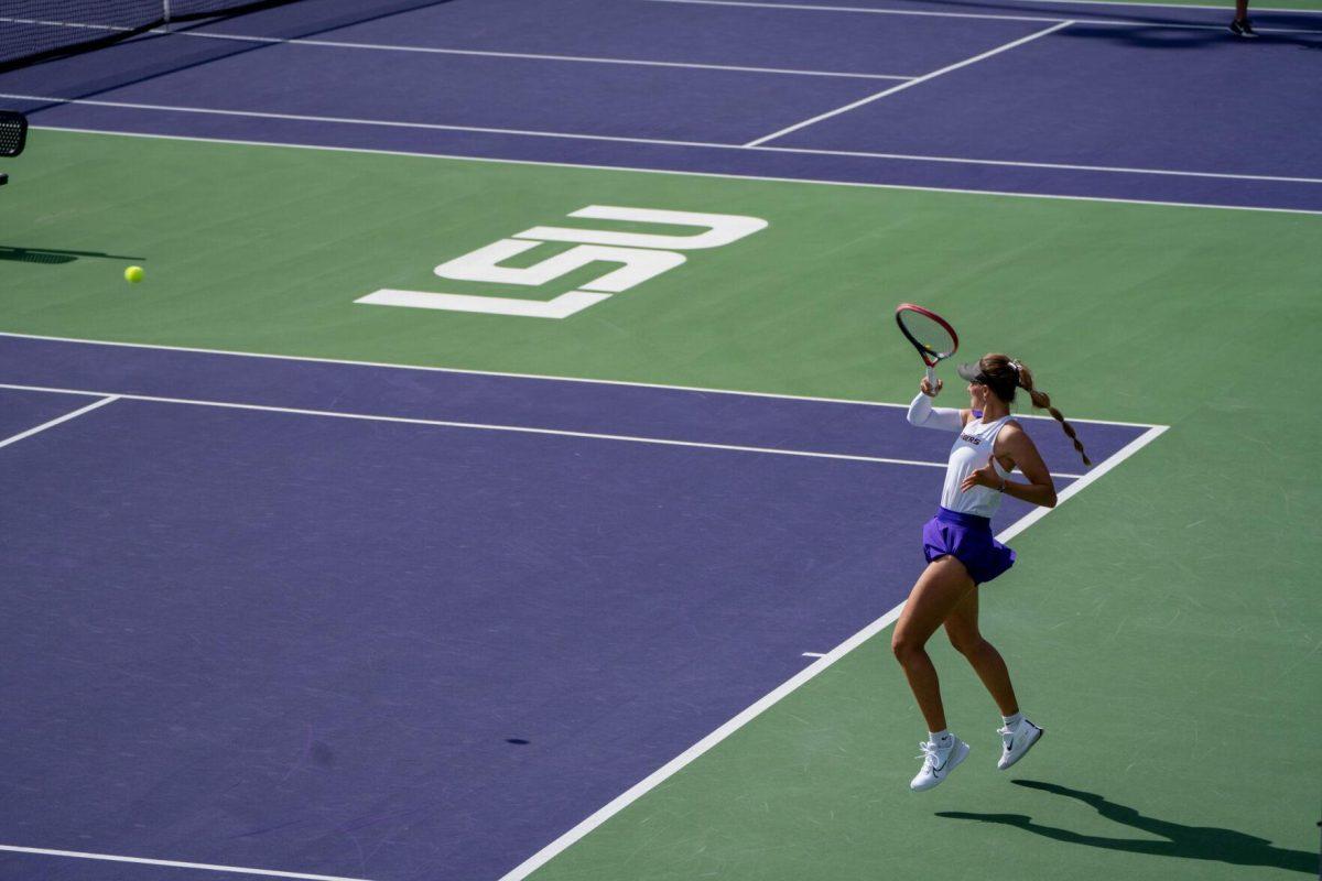 LSU women's tennis graduate student Aran Texido Garcia hits a forehand during her 6-3, 6-1 singles win against Rice Sunday, Feb. 4, 2023 at the LSU Tennis Complex on Gourrier Avenue in Baton Rouge, La.