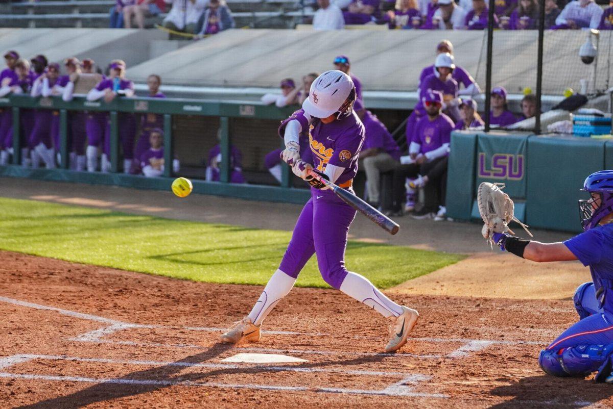 LSU softball senior infielder Danieca Coffey (13) swings for the ball Friday, Feb. 23, 2024, during LSU&#8217;s game against Boise State in Tiger Park in Baton Rouge, La.