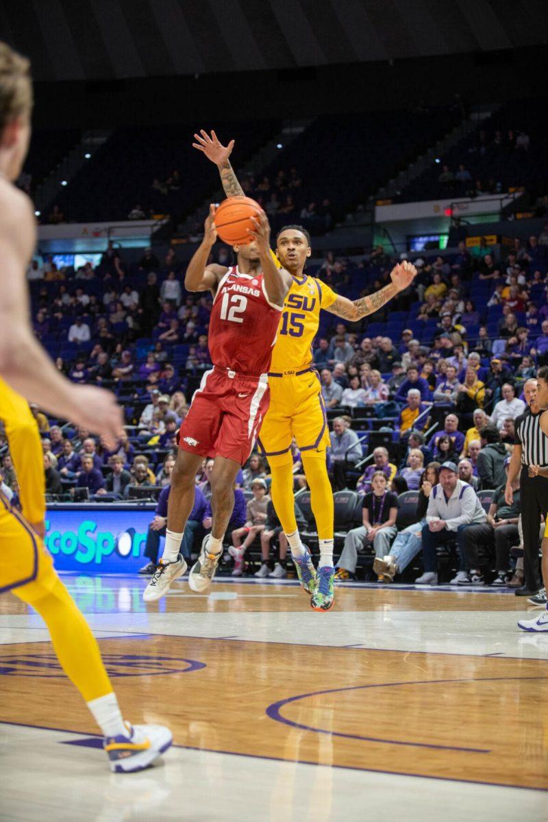 LSU men's basketball sophomore forward Tyrell Ward (15) jumps to block the ball on Saturday, Feb. 3, 2024, during LSU's 94-74 win against Arkansas in the Pete Maravich Assembly Center in Baton Rouge, La.