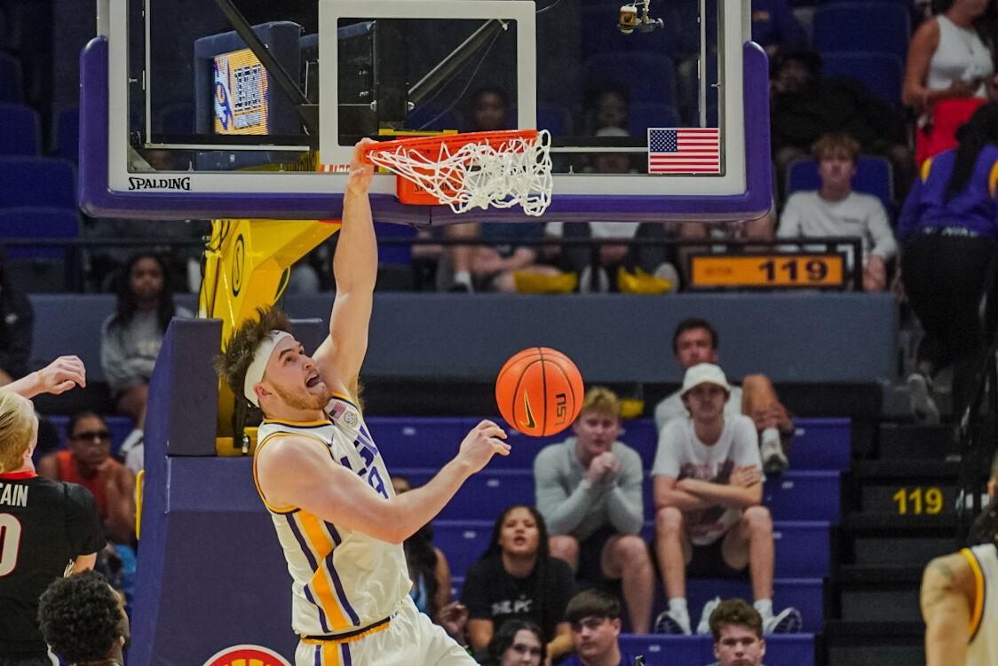 LSU men&#8217;s basketball graduate student forward Will Baker (9) dunks the ball Tuesday, Feb. 27, 2024, during LSU&#8217;s game against Georgia in the Pete Maravich Assembly Center in Baton Rouge, La.