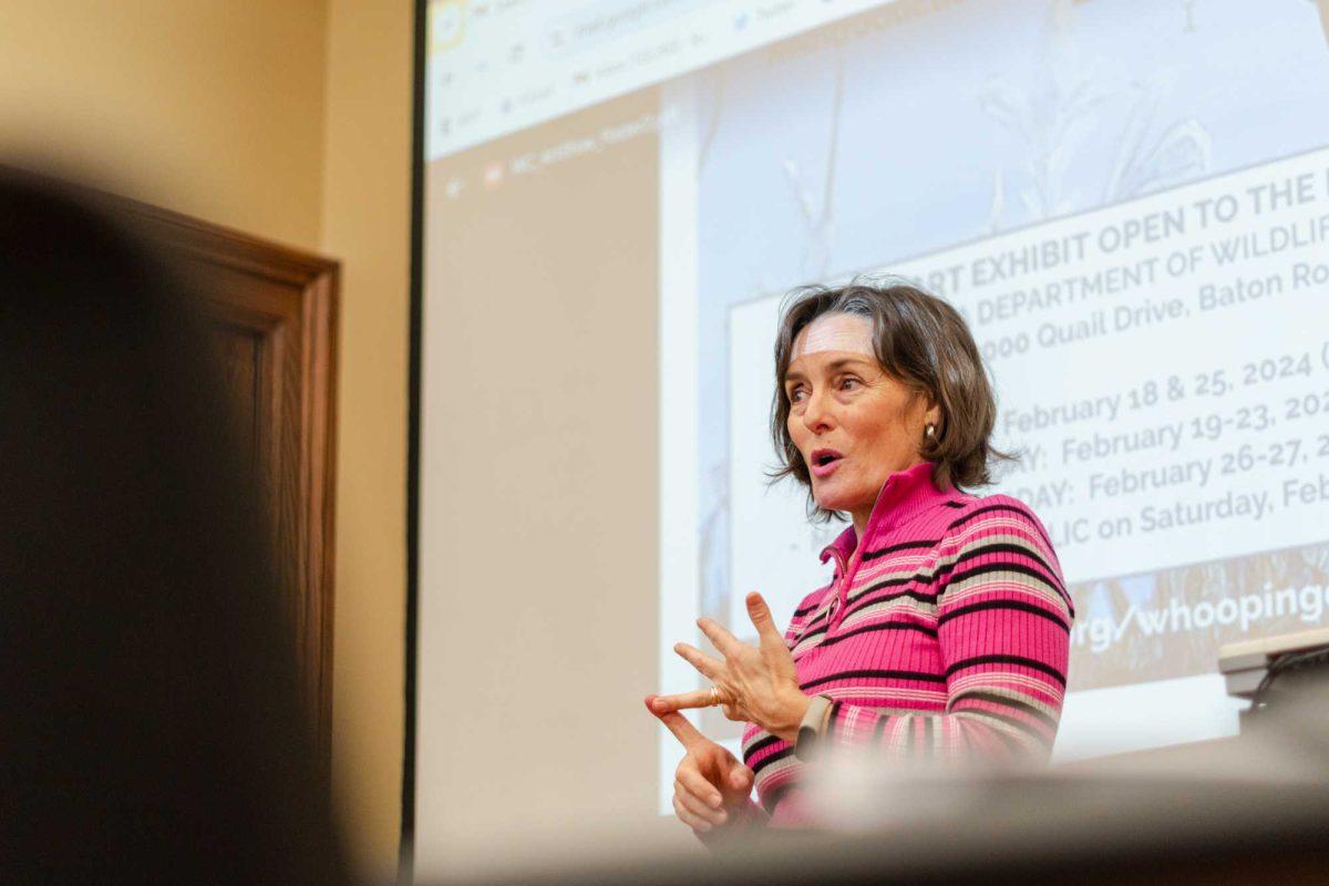 Margo Brault discusses whooping crane conservation and an art contest revolving around the birds Tuesday, Jan. 30, 2024, inside the LSU Journalism Building in Baton Rouge, La.