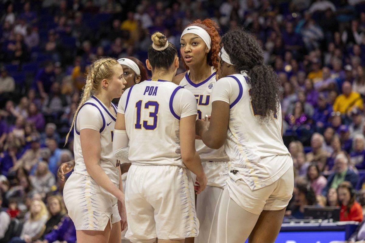 LSU women's basketball team huddles up following a Auburn score Thursday, Feb. 22, 2024, during LSU's 71-66 win over Auburn Pete Maravich Assembly Center in Baton Rouge, La.