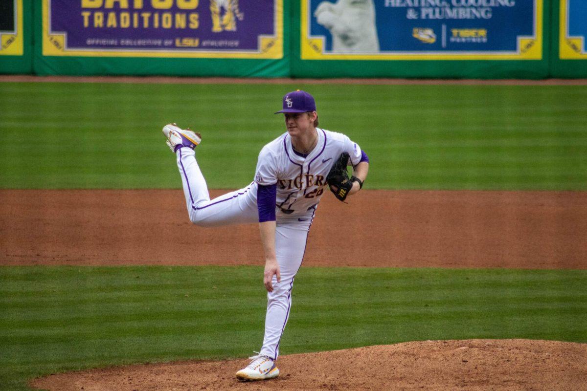 LSU baseball redshirt sophomore pitcher Kade Woods (25) pitches the ball during LSU's 11-8 win against VMI on Friday, Feb. 16, 2024, at Alex Box Stadium in Baton Rouge, La.