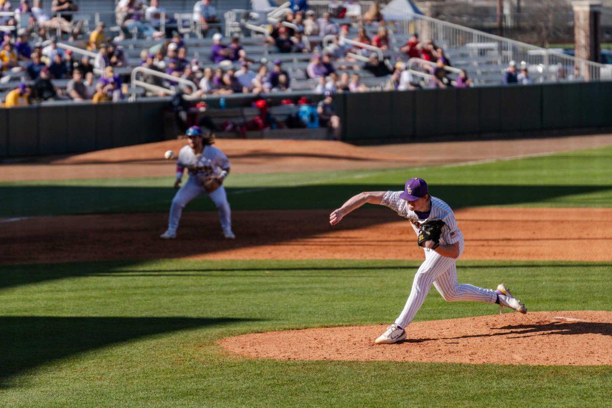 LSU baseball junior pitcher Thatcher Hurd (26) throws the ball Friday, Feb. 23, 2024, during LSU&#8217;s 5-2 loss against Stony Brook at Alex Box Stadium in Baton Rouge, La.