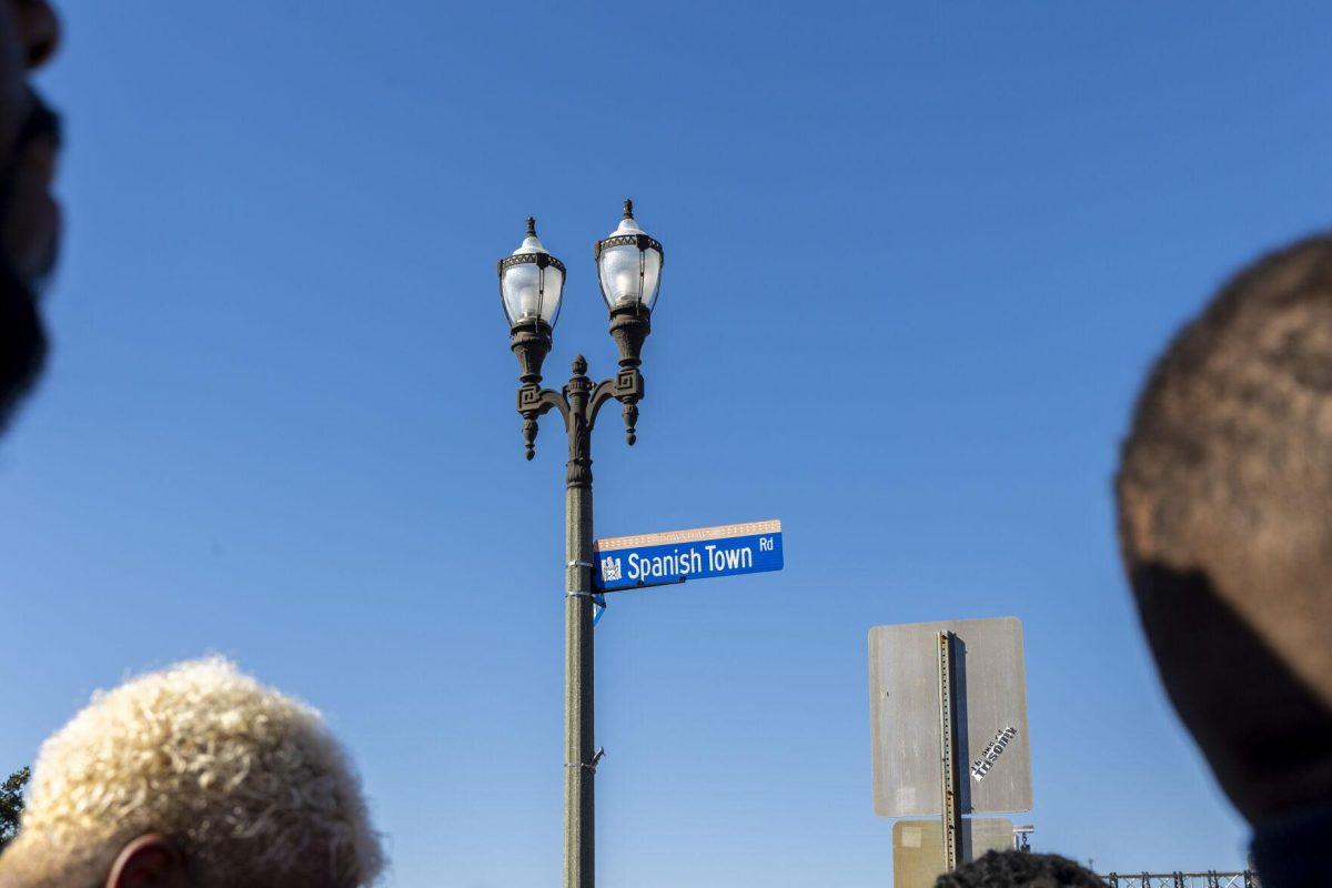 A "Spanish Town Road" sign glistens in the sun Sunday, Feb. 25, 2024, during the second annual 225Fest 2024 at 660 N. Fourth St. in Baton Rouge, La.
