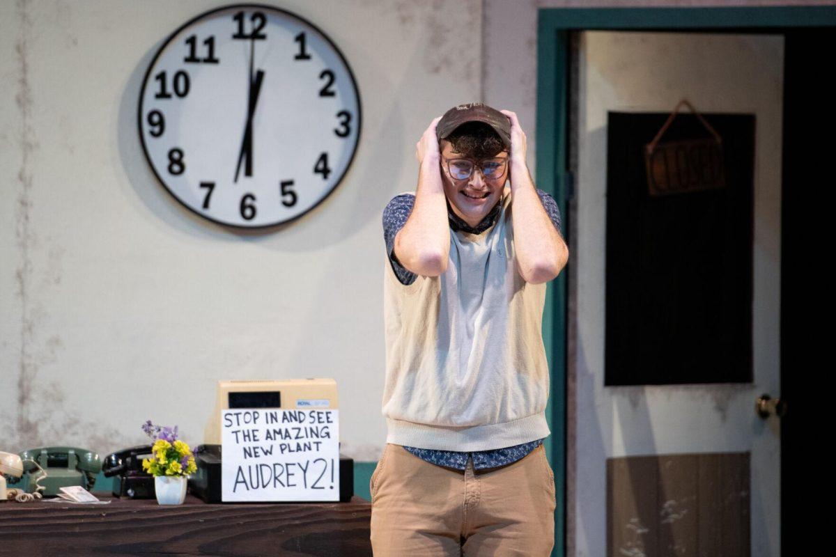 LSU psychology junior Thomas Becnel panics Thursday, Feb. 1, 2024, during LSU Musical Theatre Club's performance of "Little Shop of Horrors" at the Reilly Theatre in Baton Rouge, La.