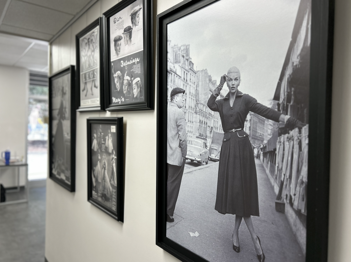 Framed pictures of fashion designers scatter the walls in the LSU Textile and Costume Museum in Baton Rouge, La. on Tuesday, Jan. 30, 2024.&#160;