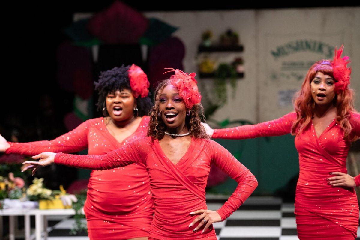 LSU social work junior Jasmine Garrison leads the trio Thursday, Feb. 1, 2024, during LSU Musical Theatre Club's performance of "Little Shop of Horrors" at the Reilly Theatre in Baton Rouge, La.