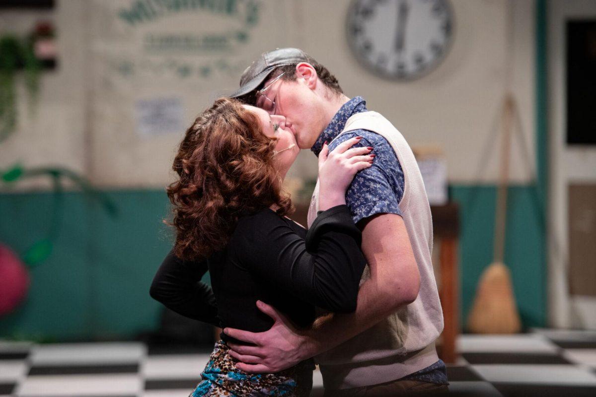 LSU theatre technology and design freshman Kamryn Hecker and psychology junior Thomas Becnel kiss Thursday, Feb. 1, 2024, during LSU Musical Theatre Club's performance of "Little Shop of Horrors" at the Reilly Theatre in Baton Rouge, La.