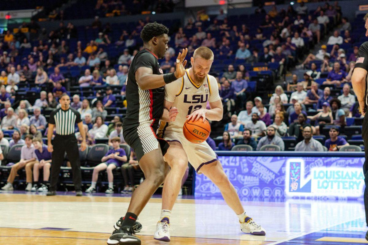 LSU men&#8217;s basketball graduate student forward Hunter Dean (12) moves toward the paint Tuesday, Feb. 27, 2024, during LSU&#8217;s 67-66 win against Georgia in the Pete Maravich Assembly Center in Baton Rouge, La.