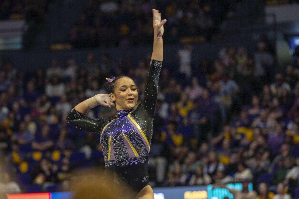 LSU gymnastics junior all-around Aleah Finnegan poses during her balance beam routine Friday, Feb. 16, 2024, during LSU's win 198.300-197.10 against Auburn in the Pete Maravich Assembly Center.