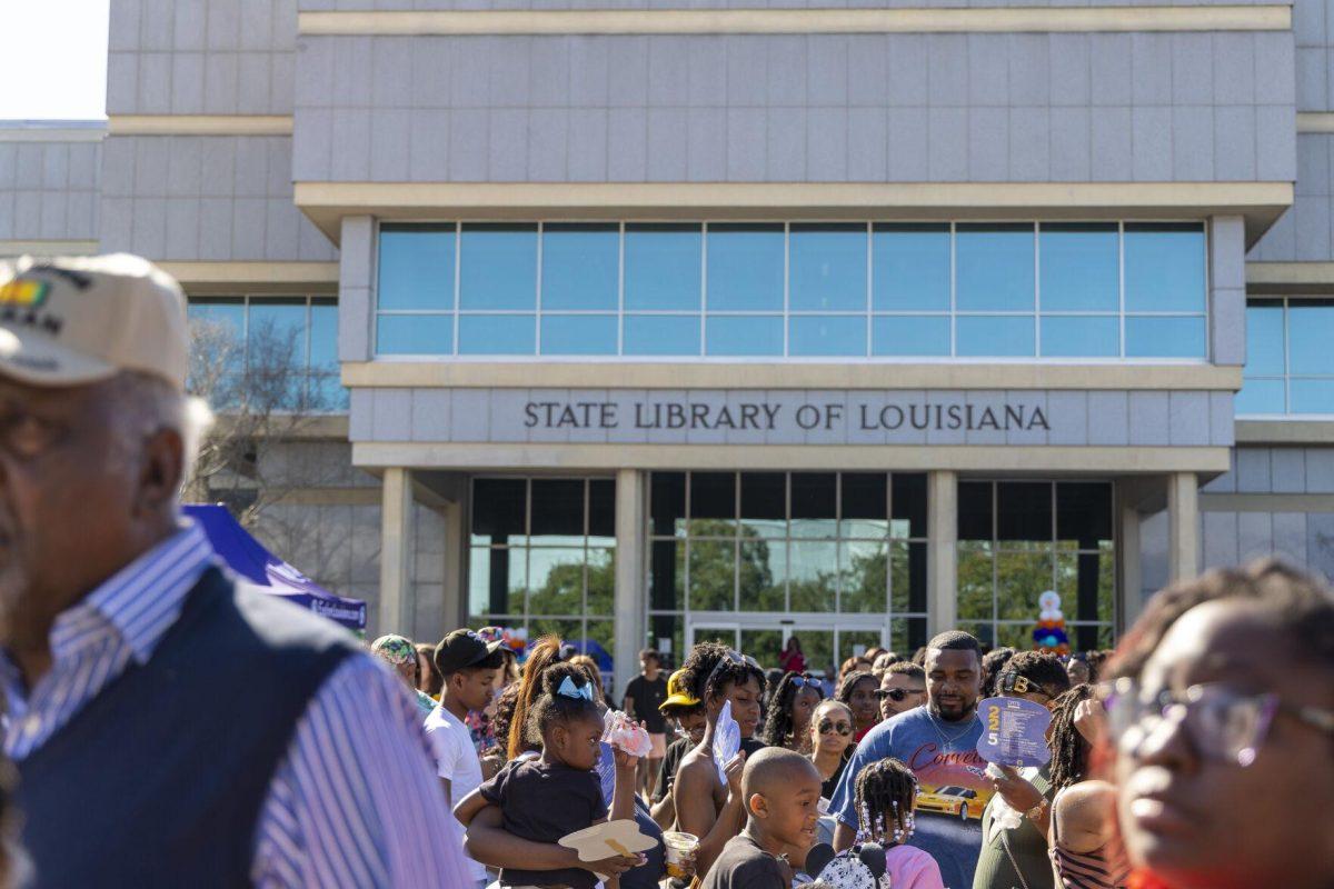 Event-goers stand in line for food in front of the State Library of Louisiana Sunday, Feb. 25, 2024, during the second annual 225Fest 2024 at 660 N. Fourth St. in Baton Rouge, La.