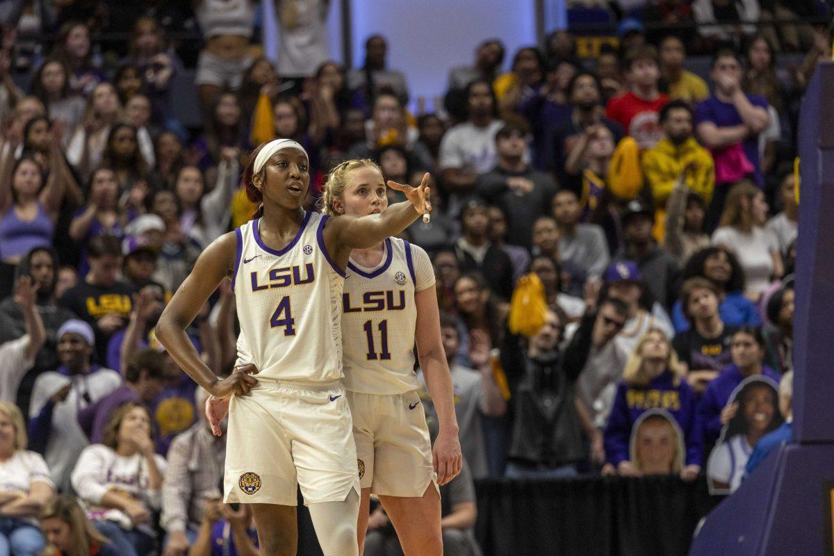 <p>LSU women's basketball sophomore guard Flau'jae Johnson (4) and graduate student guard Hailey Van Lith (11) analyze a free throw from half court Thursday, Feb. 22, 2024, during LSU's 71-66 win over Auburn Pete Maravich Assembly Center in Baton Rouge, La.</p>