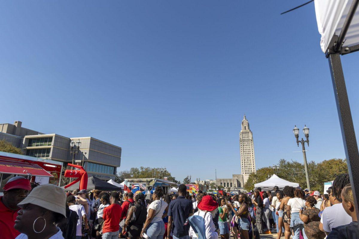 Event-goers walk through vendors Sunday, Feb. 25, 2024, during the second annual 225Fest 2024 at 660 N. Fourth St. in Baton Rouge, La.