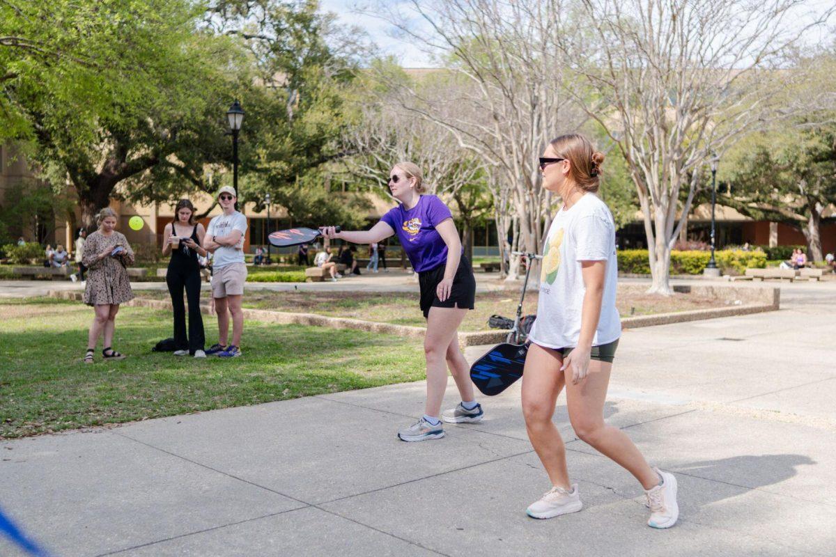 LSU public relations junior Morgan English returns the ball Thursday, March 7, 2024, in the Quad on LSU's campus in Baton Rouge, La.