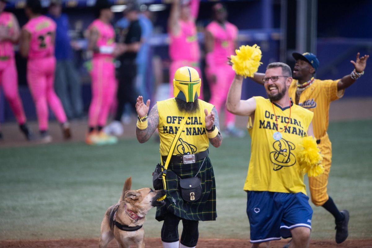 The Man-nanas, the Savannah Banana's dad bod cheerleading squad, walk across the field Thursday, March 14, 2024, before the Savannah Bananas 5-4 loss to the Party Animals during their world tour stop at Alex Box Stadium in Baton Rouge, La.