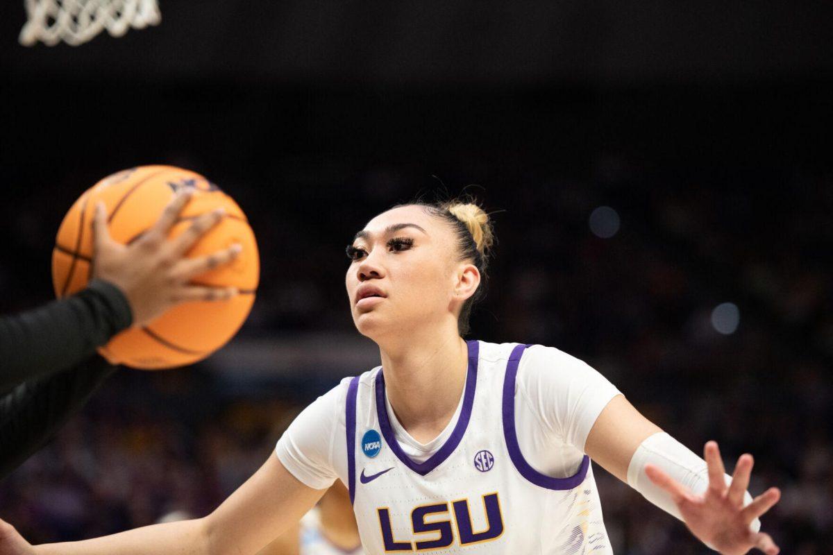 LSU women&#8217;s basketball junior guard Lear-Tear Poa (13) faces off with her opponent Friday, March 22, 2024, during LSU&#8217;s 70-60 first-round NCAA March Madness tournament victory against Rice at the Pete Maravich Center in Baton Rouge, La.