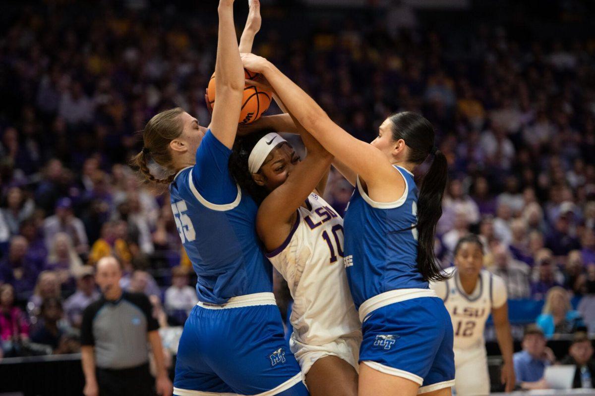 LSU women&#8217;s basketball junior forward Angel Reese (10) struggles for the ball Sunday, March 24, 2024, during LSU&#8217;s 83-56 second-round NCAA tournament win against Middle Tennessee at the Pete Maravich Center in Baton Rouge, La.