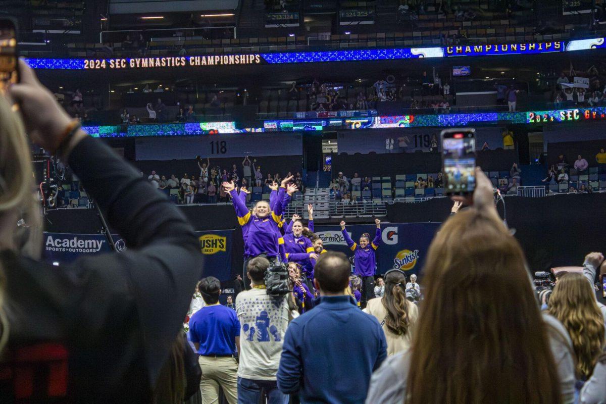 The LSU gymnastics team is recognized as winners of the 2024 SEC Gymnastics Championship Saturday, March 23, 2024, following LSU's 198.075 victory in the Smoothie King Center, New Orleans, La.