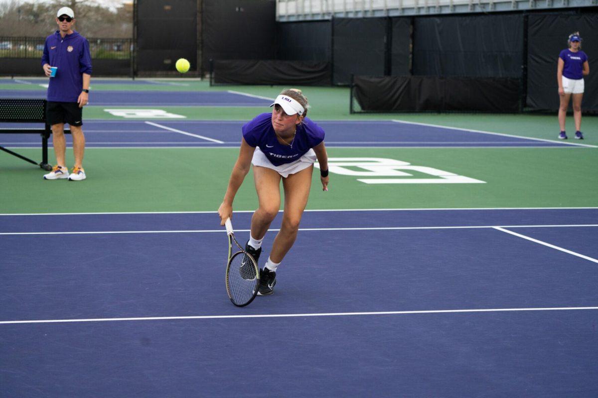 LSU women's tennis freshman Kenna Erickson hits a volley during her 6-1 doubles win against ULM Sunday, March 3, 2024, at the LSU Tennis Complex on Gourrier Avenue in Baton Rouge, La.