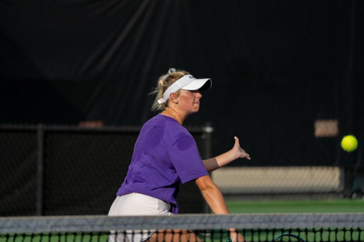 LSU women's tennis freshman Emma Grant hits a volley during her 6-4 doubles win against ULM Sunday, March 3, 2024, at the LSU Tennis Complex on Gourrier Avenue in Baton Rouge, La.