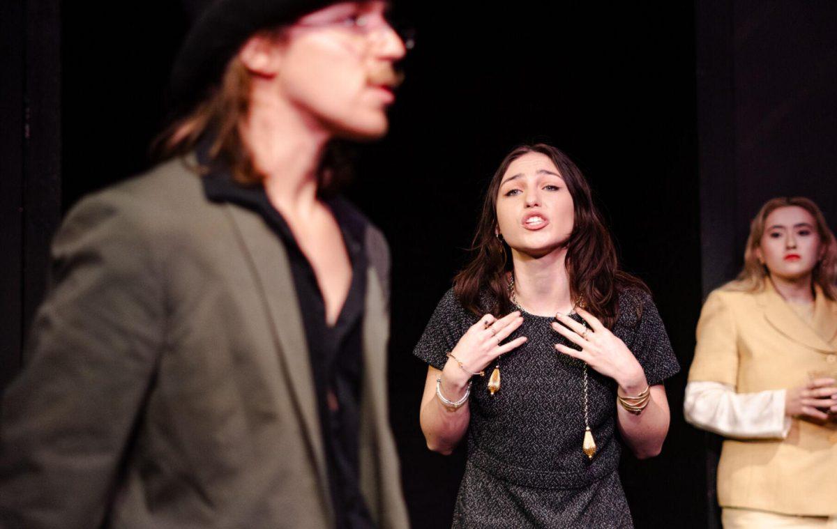 Myrtle Wilson (Emmy Reedy) yells at Tom Buchanan (Cameron Beall) in a production of Yearning Sunday, March 3, 2024, in Coates Hall on LSU's campus.