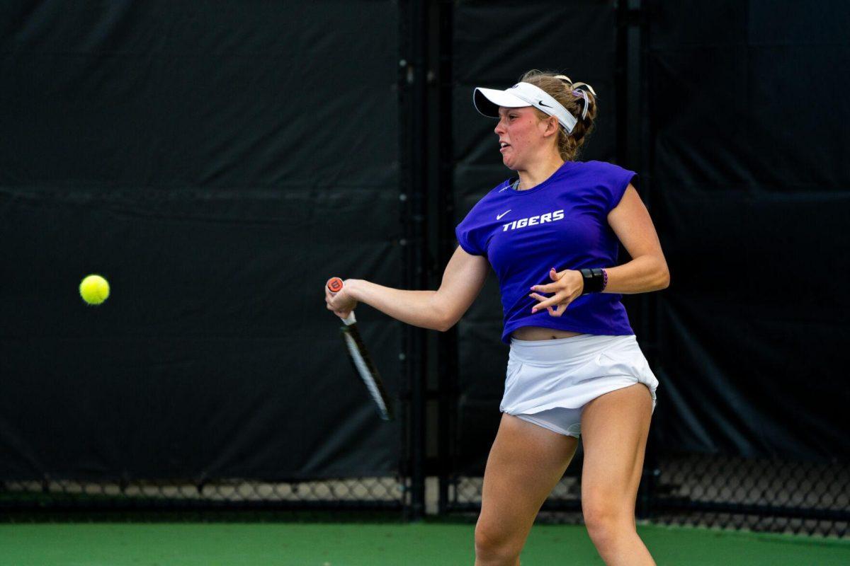 LSU women's tennis freshman Kenna Erickson hits a forehand during her 6-1 doubles win against ULM Sunday, March 3, 2024, at the LSU Tennis Complex on Gourrier Avenue in Baton Rouge, La.