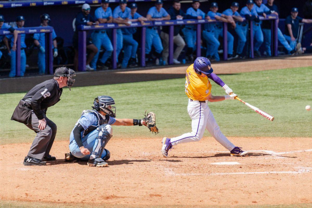 LSU baseball senior outfielder Mac Bingham (9) swings for the ball Sunday, March 10, 2024, during LSU's 2-1 loss to Xavier in Alex Box Stadium in Baton Rouge, La.