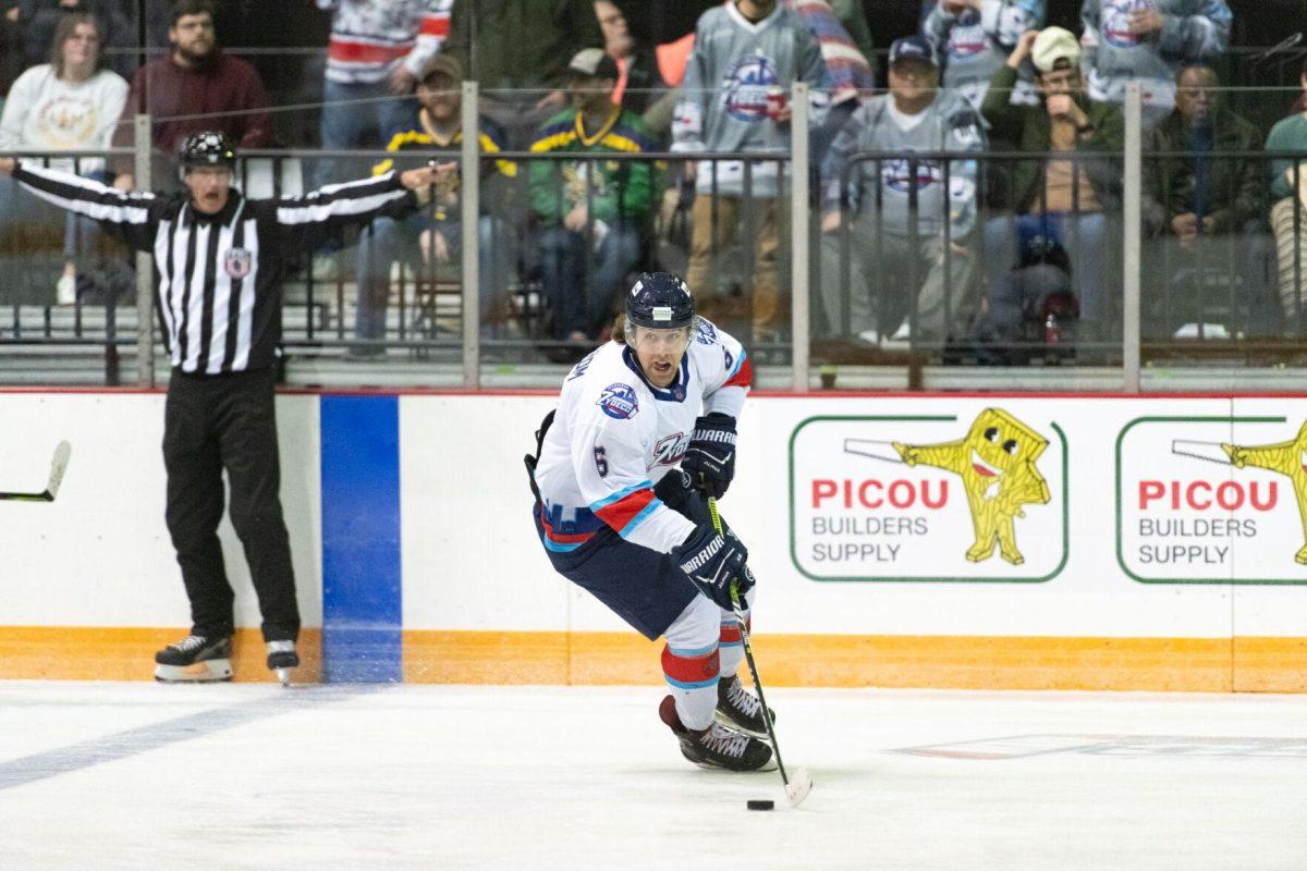 Baton Rouge Zydeco hockey pro forward Mathias Tellstrom (6) hits the puck Thursday, Feb. 29, 2024, during Zydeco's 5-3 win against the Carolina Thunderbirds at the Raising Canes River Center in Baton Rouge, La.