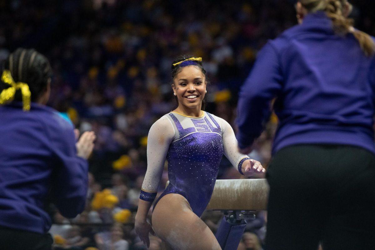 LSU gymnastics freshman all-around Konnor McClain smiles after her routine Friday, March 15, 2024, before LSU's 198.250-196.075 win during North Carolina at the Pete Maravich Assembly Center in Baton Rouge, La.