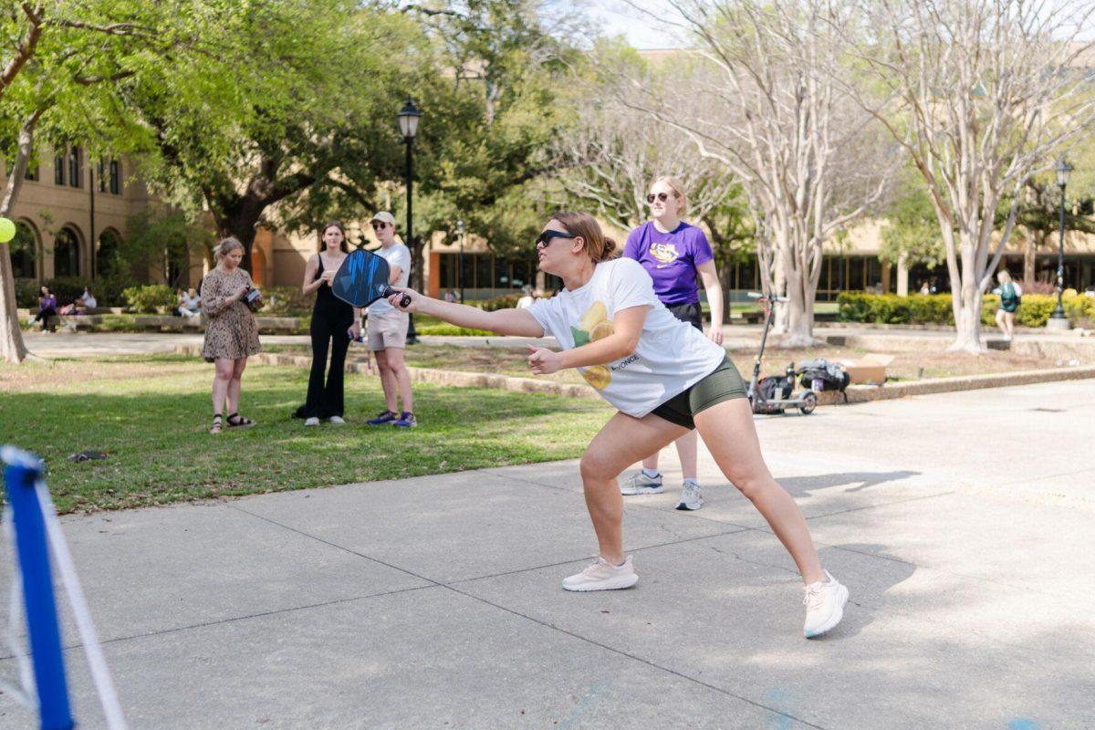 LSU accounting junior Catherine LeFevre hits the ball Thursday, March 7, 2024, in the Quad on LSU's campus in Baton Rouge, La.