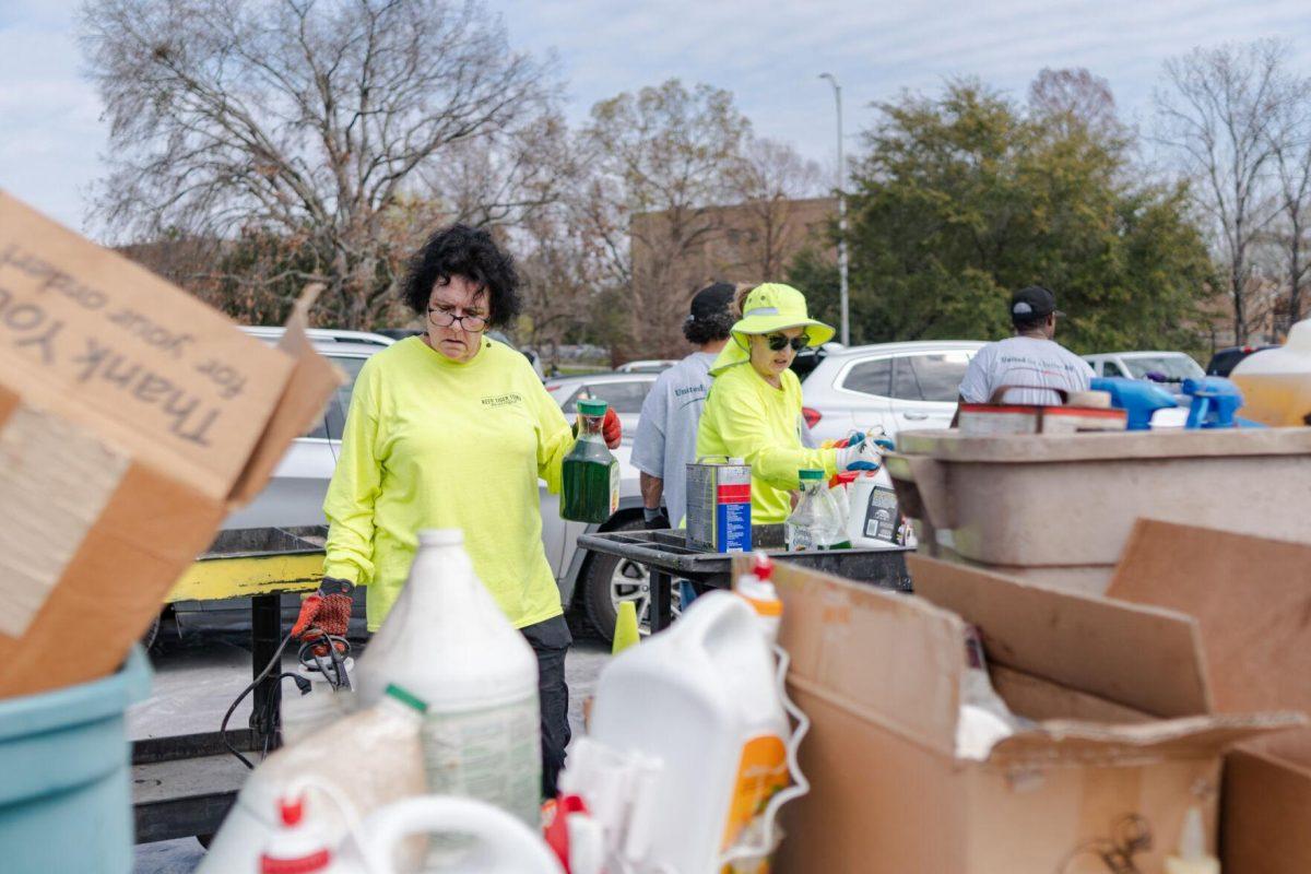 Workers sort out various items Saturday, March 2, 2024, at the Household Hazardous Materials Collection Day on LSU's campus in Baton Rouge, La.