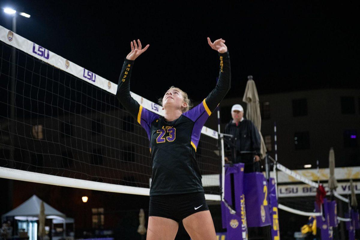 LSU beach volleyball freshman Amelia Taft (23) looks up at the ball Saturday, March 2, 2024, during LSU's 5-0 win against Nebraska at the LSU Beach Volleyball Stadium in Baton Rouge, La.