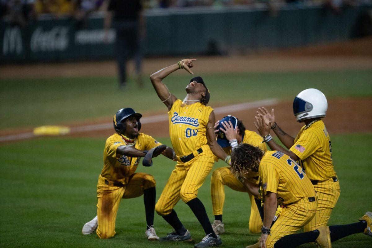 The Savannah Bananas perform a dance routine Thursday, March 14, 2024, during the Savannah Bananas 5-4 loss to the Party Animals during their world tour stop at Alex Box Stadium in Baton Rouge, La.