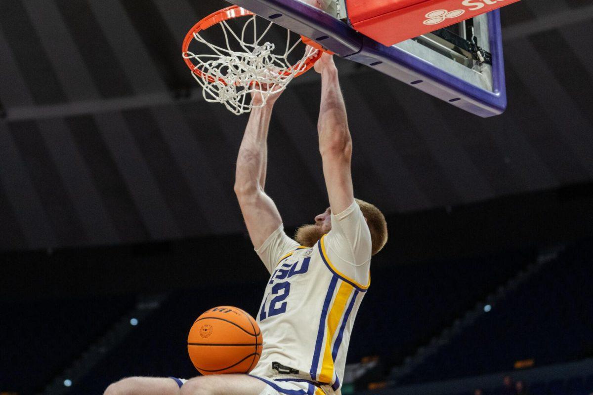 LSU men&#8217;s basketball graduate student forward Hunter Dean (12) dunks the ball Tuesday, March 19, 2024, during LSU&#8217;s 84-77 loss to the University of North Texas at the PMAC in Baton Rouge, La.