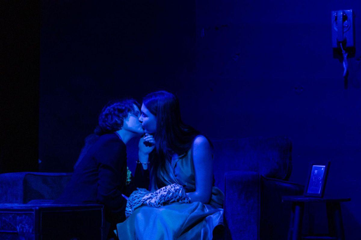 Jane Gatsby (Ava Russell) and Daisy Buchanan (Elyse Nave) kiss in a production of Yearning Sunday, March 3, 2024, in Coates Hall on LSU's campus.