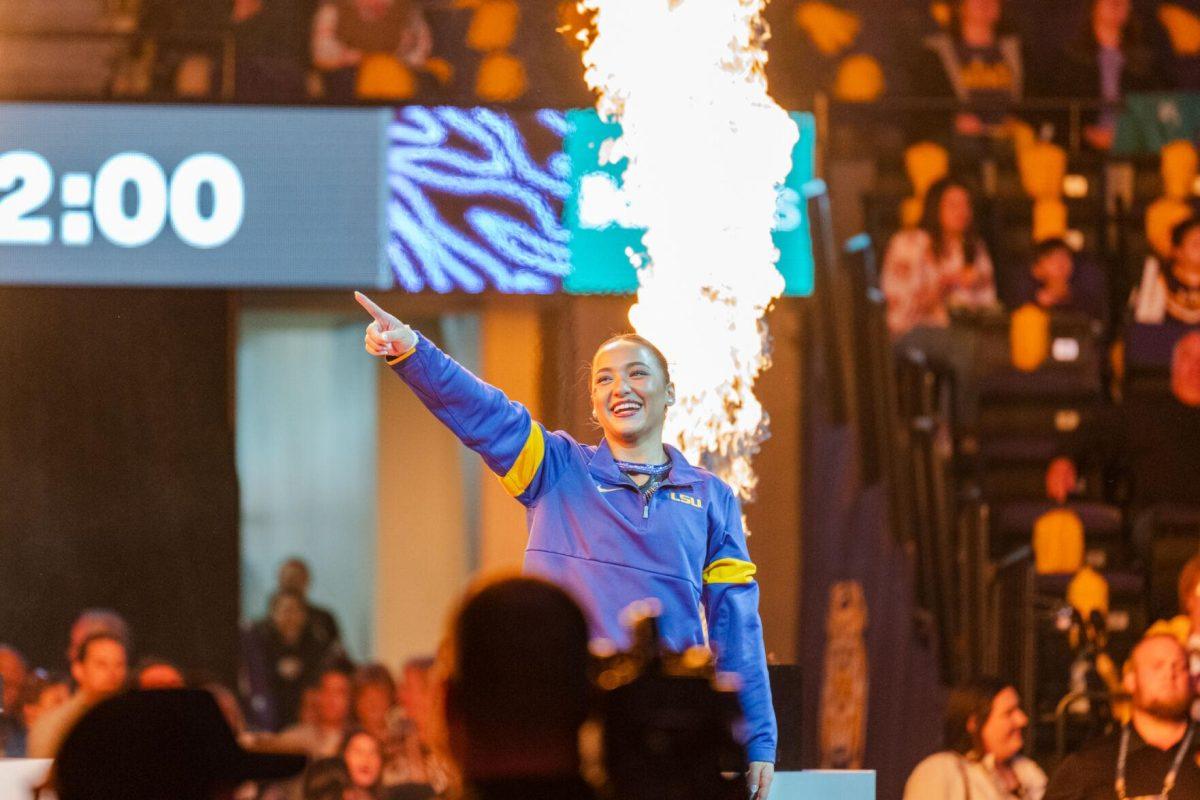 LSU gymnastics all-around junior Aleah Finnegan points into the crowd Friday, March 1, 2024, before LSU&#8217;s 198.325-197.325 win against Alabama in the Pete Maravich Assembly Center in Baton Rouge, La.