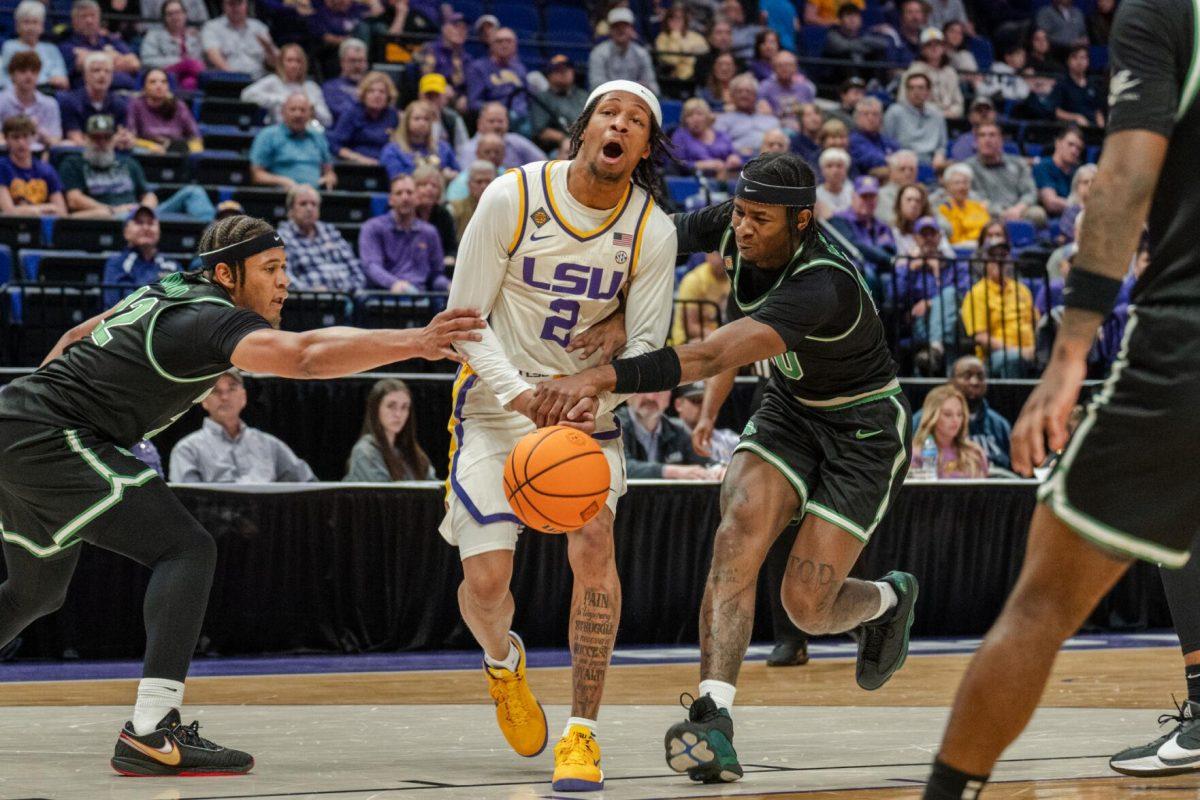 LSU men&#8217;s basketball freshman guard Mike Williams III (2) loses control of the ball Tuesday, March 19, 2024, during LSU&#8217;s 84-77 loss to the University of North Texas at the PMAC in Baton Rouge, La.