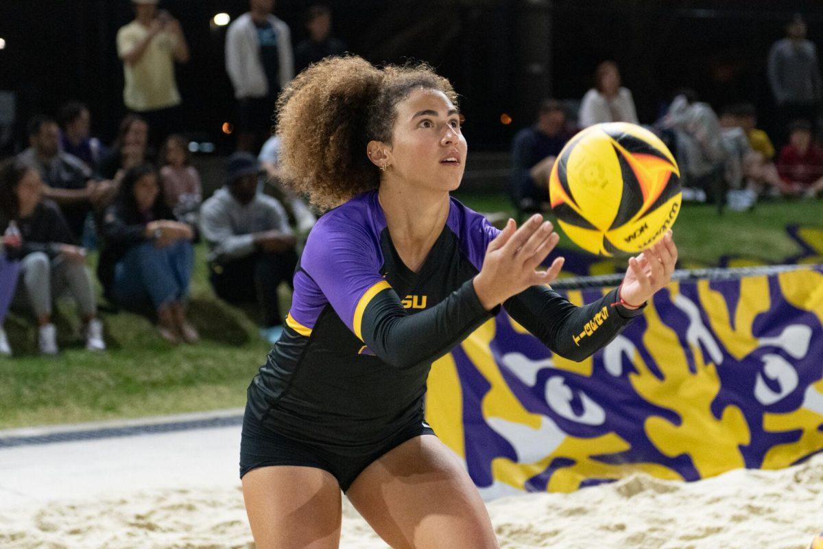 LSU beach volleyball freshman Yali Ashush (26) serves Saturday, March 2, 2024, during LSU's 5-0 win against Nebraska at the LSU Beach Volleyball Stadium in Baton Rouge, La.