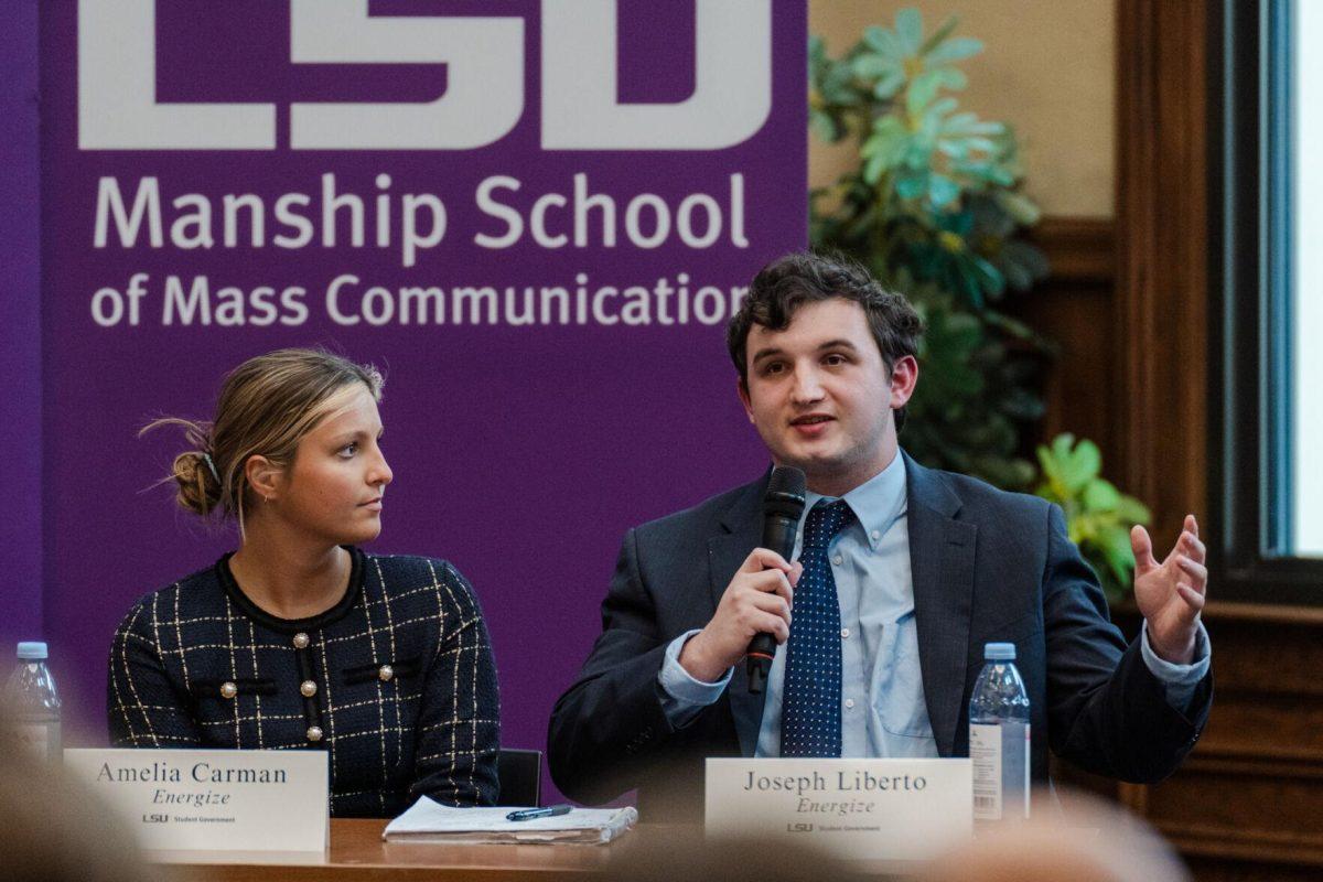 Joseph Liberto answers a question as Amelia Carman listens Monday, March 18, 2024, inside the Holliday Forum at LSU in Baton Rouge, La.